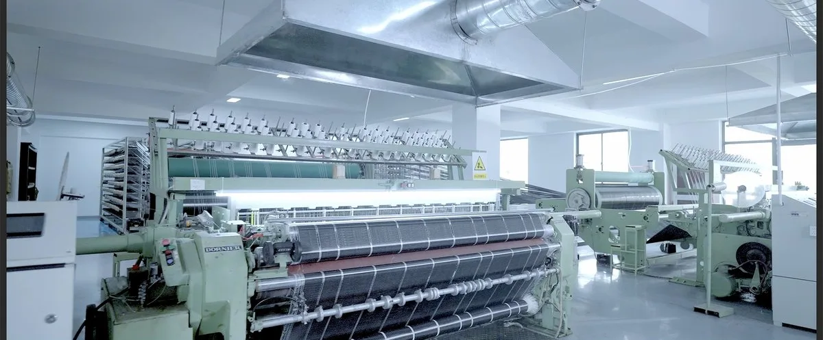 XINCHOR factory — Carbon fiber weaving